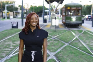 Black woman in scrubs new orleans streetcar